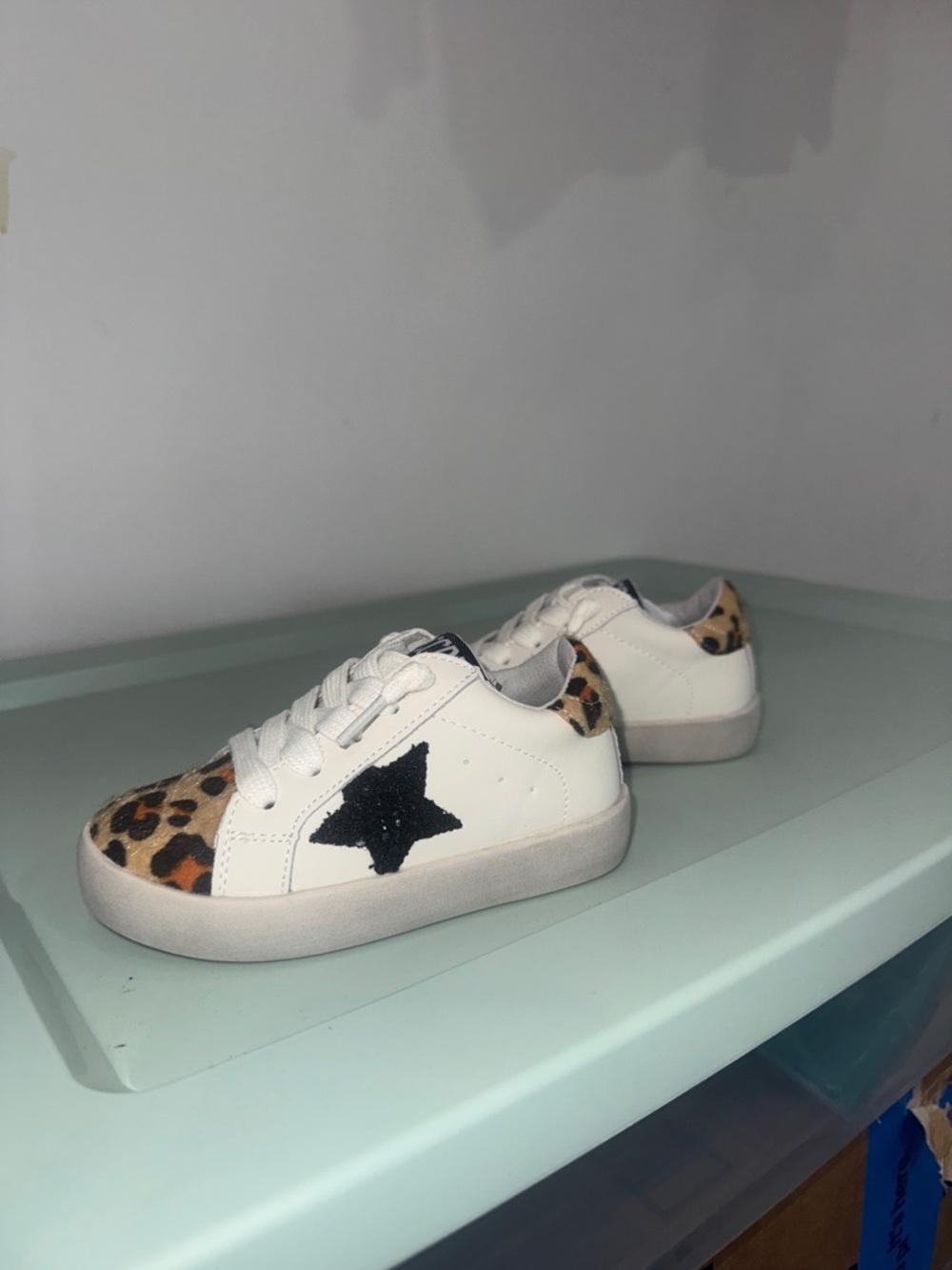 White Kids Sneakers with Leopard Accents and Black Star